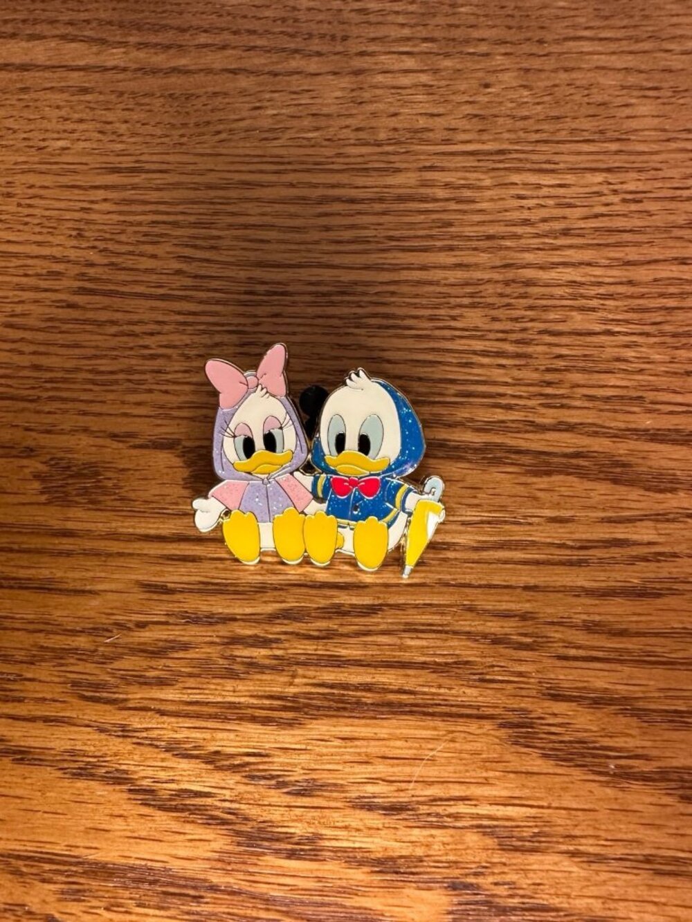 Donald and Daisy Duck in Raincoats Shanghai Disney pin